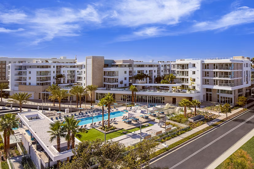 Resort-style pool with lounge chairs at Neptune Marina Apartments in Marina del Rey