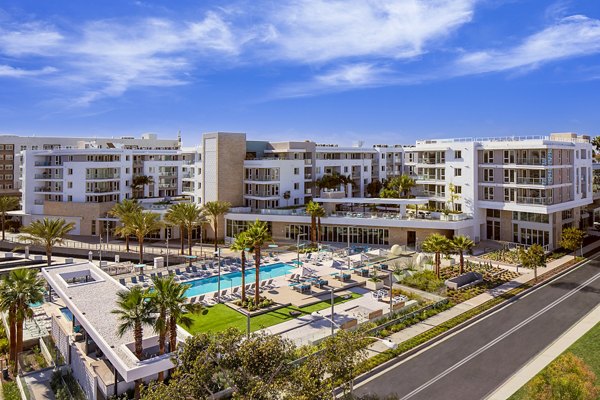 Resort-style pool with lounge chairs at Neptune Marina Apartments in Marina del Rey