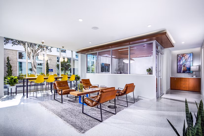 Contemporary clubhouse with sleek dÃ©cor and open seating area at Neptune Marina Apartments