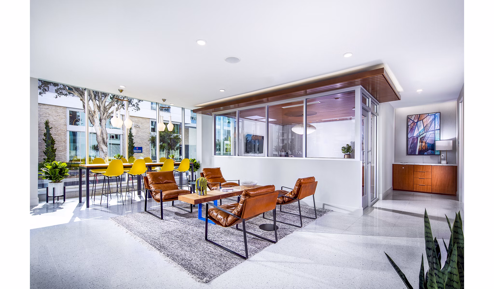 Contemporary clubhouse with sleek dÃ©cor and open seating area at Neptune Marina Apartments