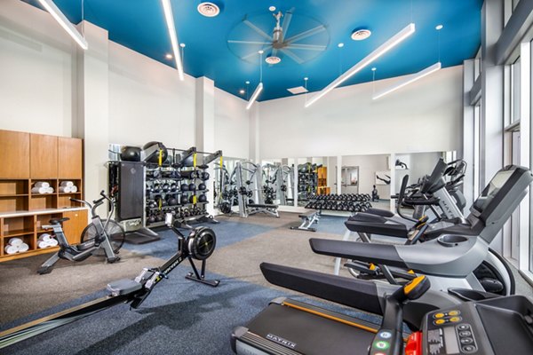 Fitness center featuring modern equipment at Neptune Marina Apartments