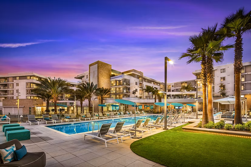 Resort-style pool area at Neptune Marina Apartments overlooking marina, perfect for relaxation and leisure activities