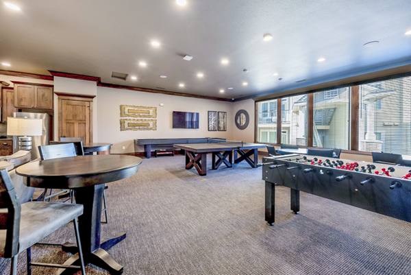 clubhouse/game room at Central Park Apartments