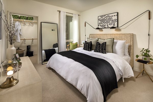 Cozy bedroom with modern decor at One Paseo Living Apartments