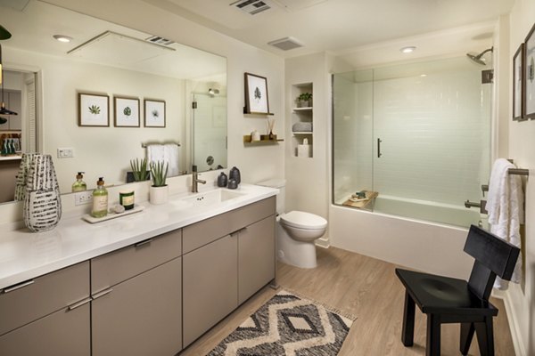 Luxurious bathroom with modern fixtures at One Paseo Living Apartments