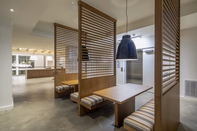 Clubhouse featuring modern lounge area at One Paseo Living Apartments in San Diego, ideal for social gatherings and relaxation