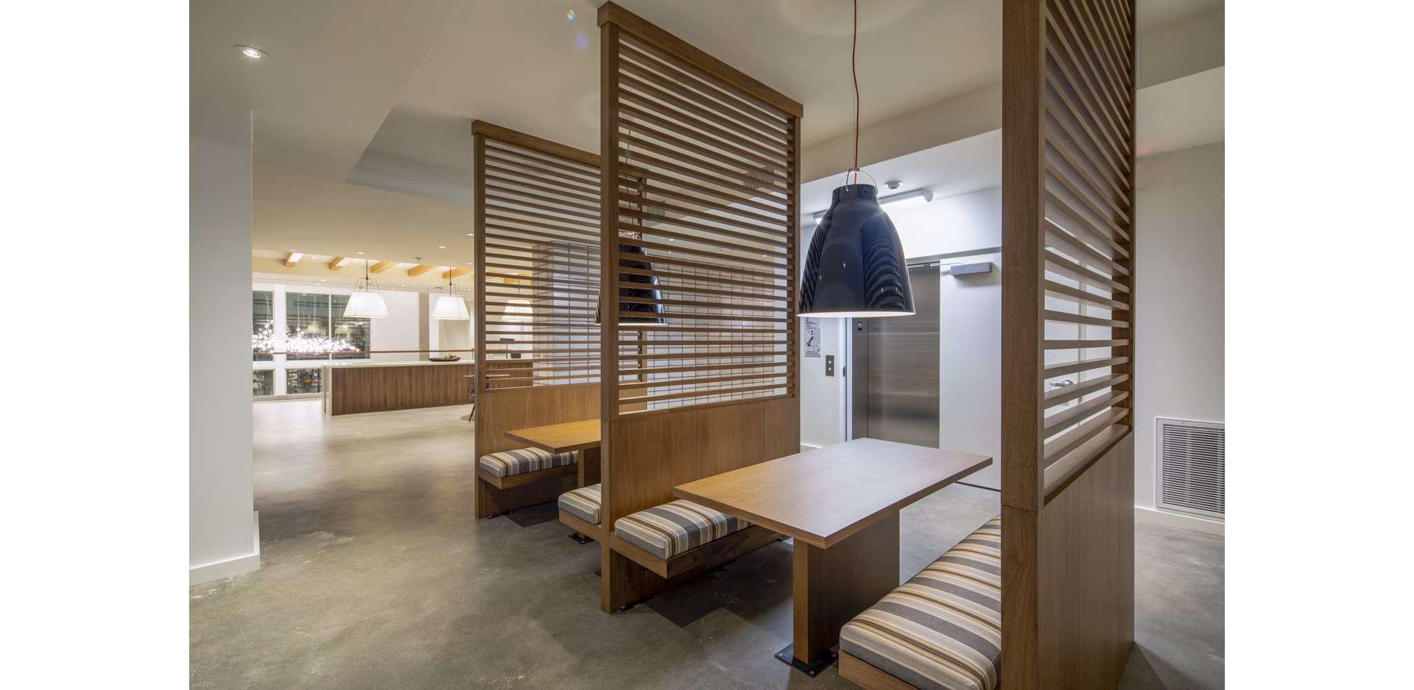 Clubhouse featuring modern lounge area at One Paseo Living Apartments in San Diego, ideal for social gatherings and relaxation