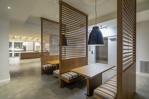Clubhouse featuring modern lounge area at One Paseo Living Apartments in San Diego, ideal for social gatherings and relaxation