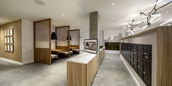 Mail room with organized package lockers at One Paseo Living Apartments