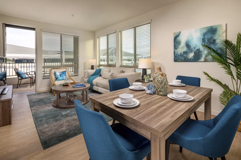 Elegant dining area with modern furnishings at One Paseo Living Apartments â€“ Greystar luxury apartments in San Diego