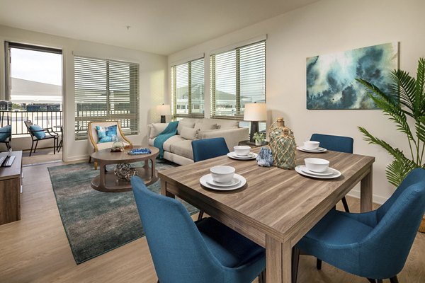 Elegant dining area with modern furnishings at One Paseo Living Apartments â€“ Greystar luxury apartments in San Diego