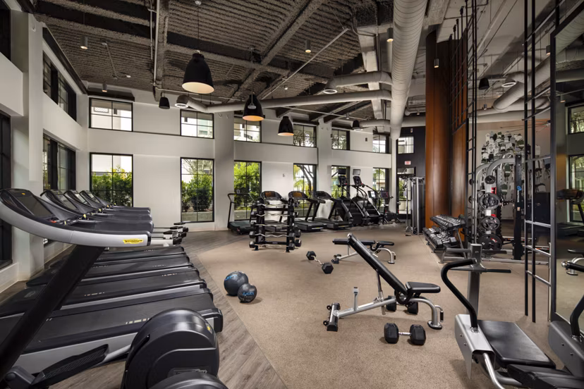 Fully-equipped fitness center at One Paseo Living Apartments