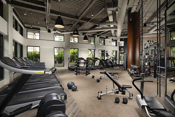Fully-equipped fitness center at One Paseo Living Apartments