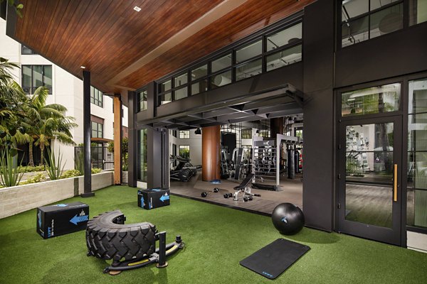 State-of-the-art fitness center with modern equipment at One Paseo Living Apartments