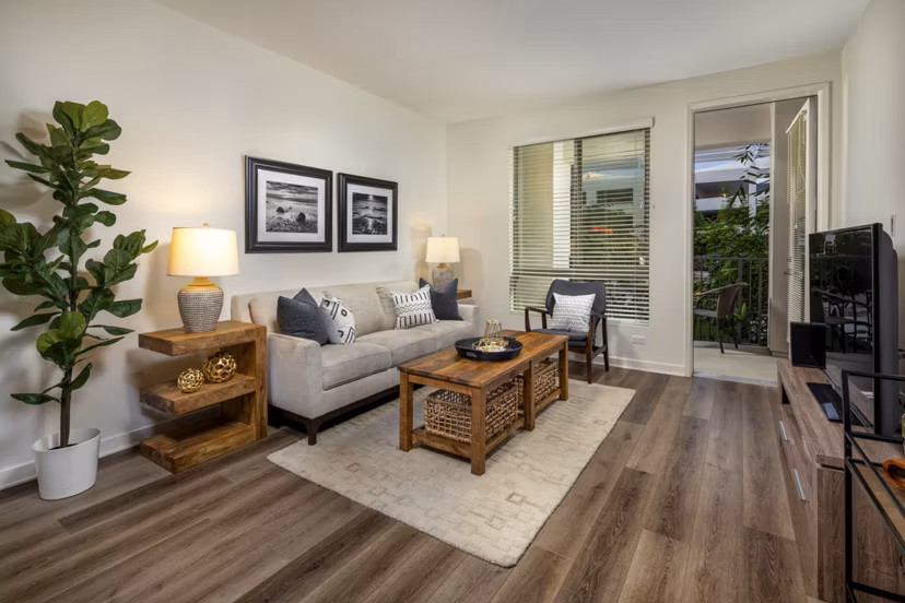 One Paseo Living Apartments: Modern living room with stylish decor and large windows in luxury setting