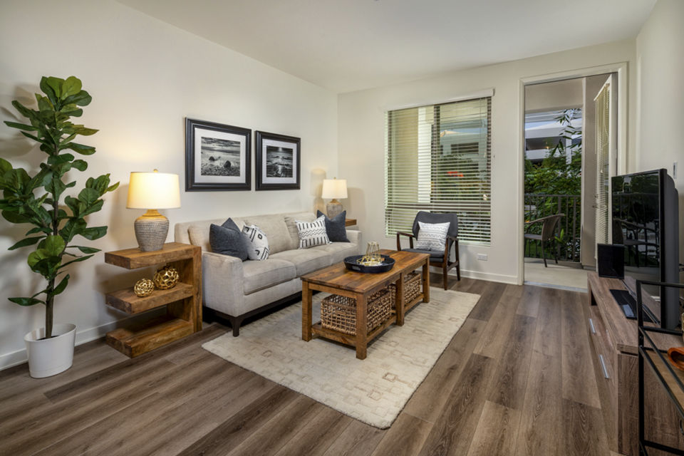 One Paseo Living Apartments: Modern living room with stylish decor and large windows in luxury setting