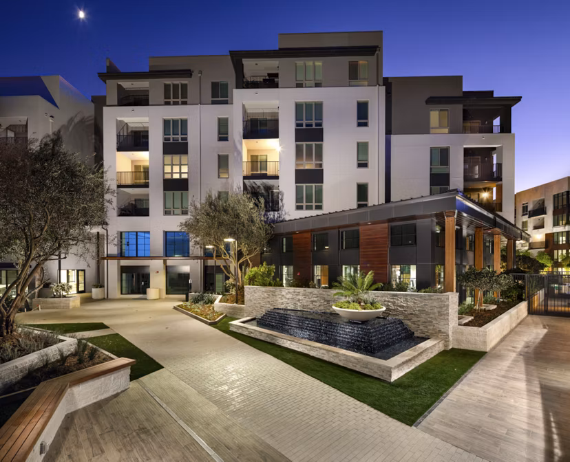 Inviting courtyard with lush landscaping at One Paseo Living Apartments