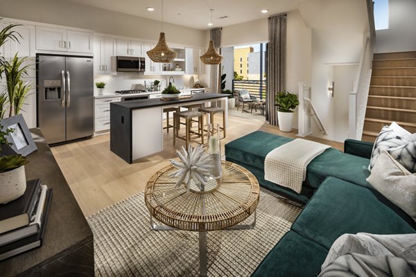 Dining area with elegant lighting and modern furniture at Anden luxury apartments
