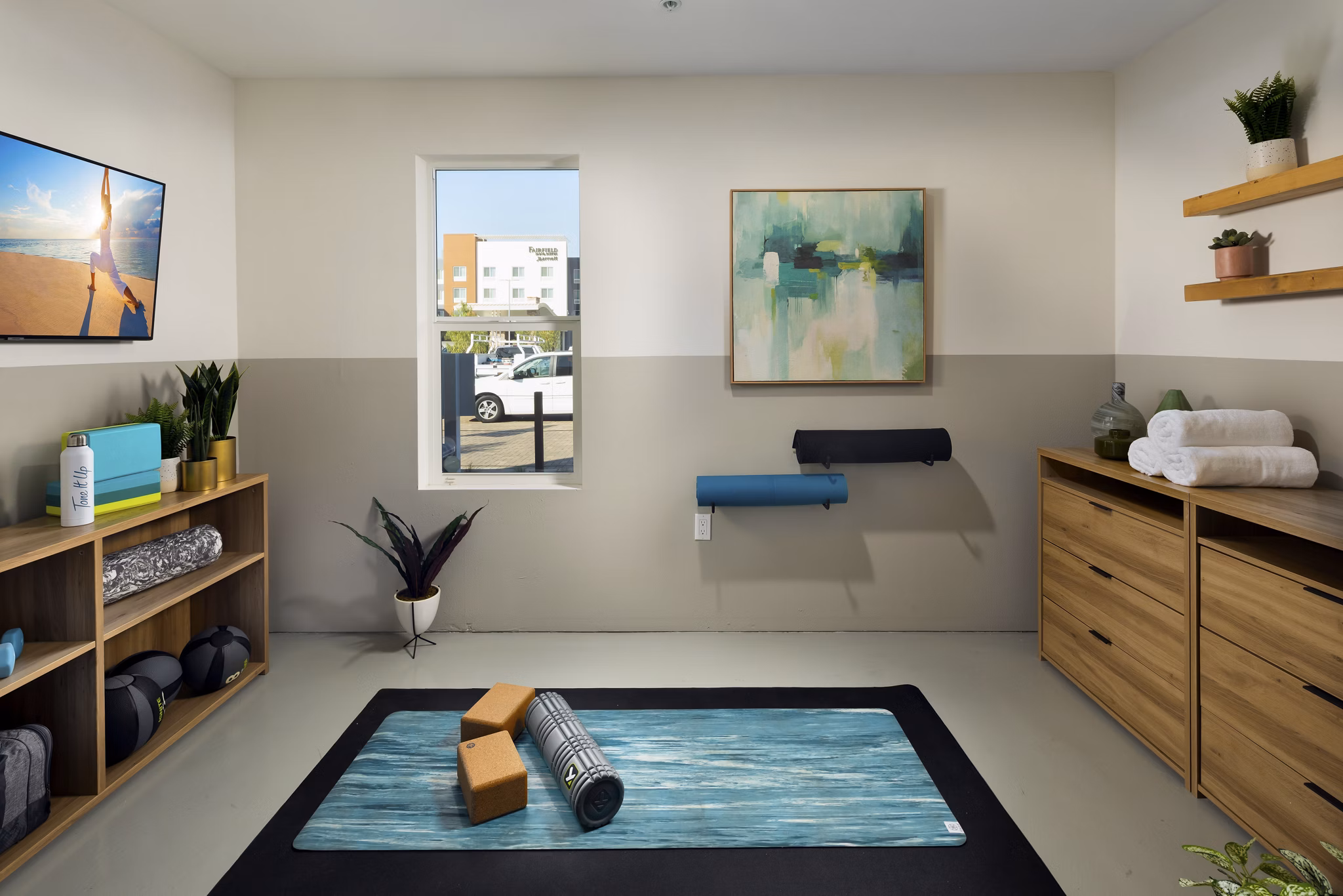 Tranquil yoga and spin studio with modern equipment at Anden luxury apartments