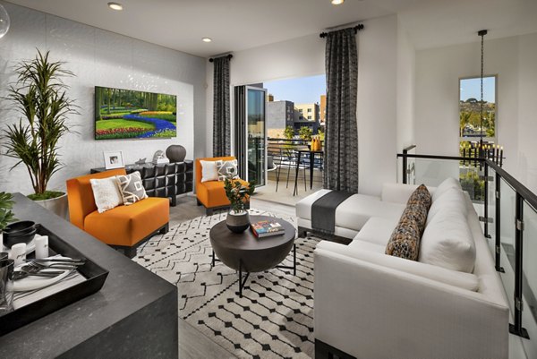 Spacious living room with modern furnishings in Anden luxury apartments