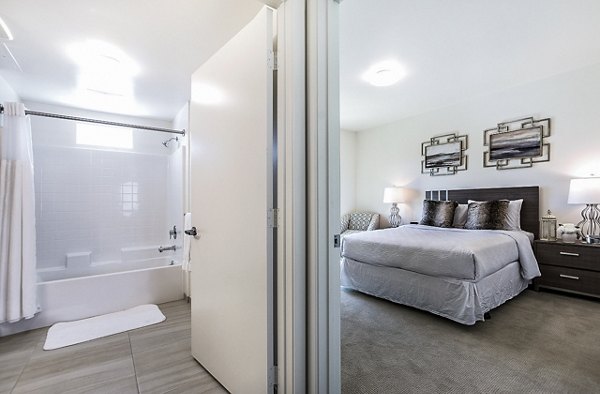 Stylish bedroom with modern decor at CC Tan Center Apartments
