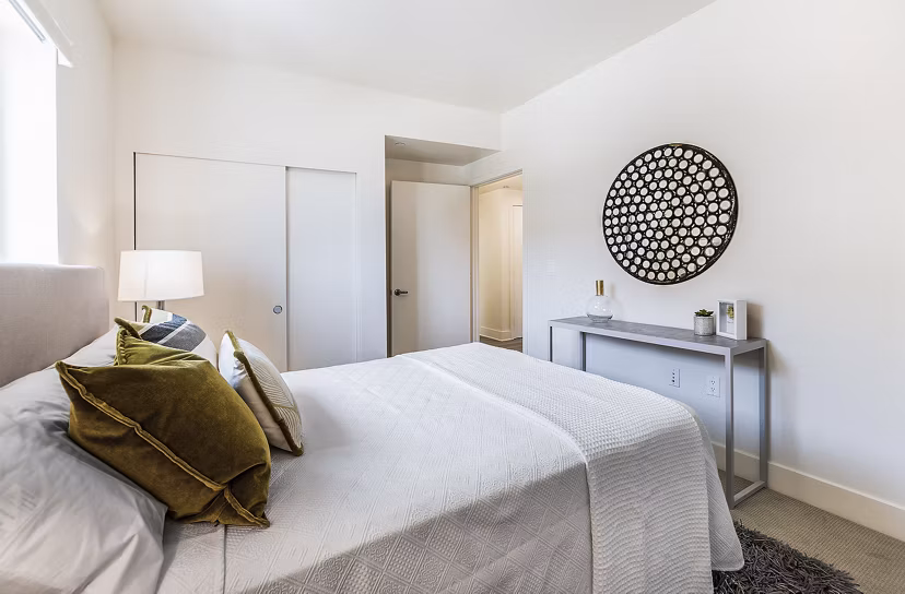 Modern bedroom with stylish decor at CC Tan Center Apartments