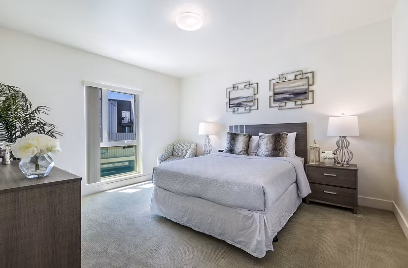 Spacious bedroom with modern decor at CC Tan Center Apartments