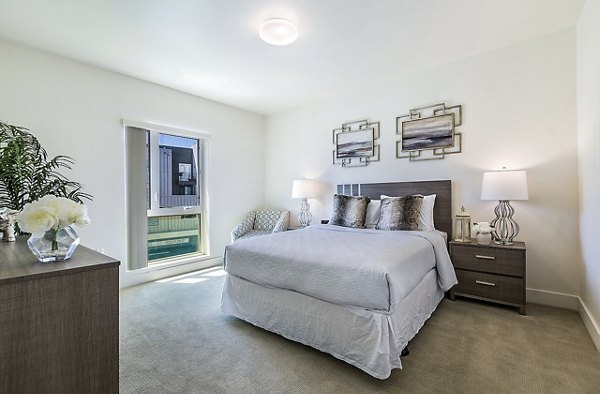 Spacious bedroom with modern decor at CC Tan Center Apartments