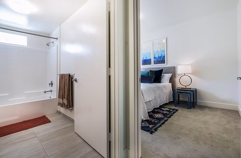 Cozy bedroom with modern furnishings at CC Tan Center Apartments