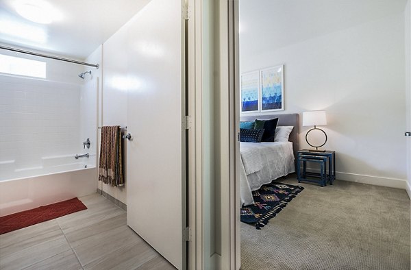 Cozy bedroom with modern furnishings at CC Tan Center Apartments