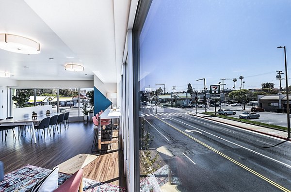 Elegant clubhouse lobby with modern seating and ambient lighting at CC Tan Center Apartments