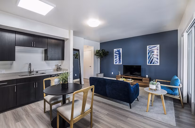 Dining room with modern furnishings in CC Tan Center Apartments, ideal for luxury living