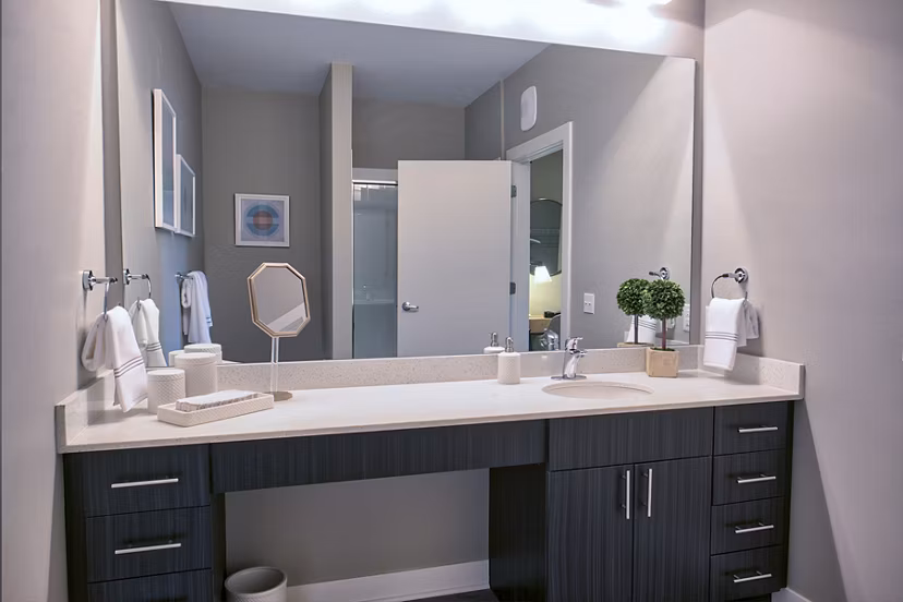 Modern bathroom with sleek design elements at Ridge at Robinson Apartments