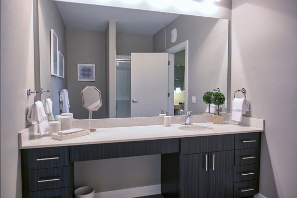 Modern bathroom with sleek design elements at Ridge at Robinson Apartments