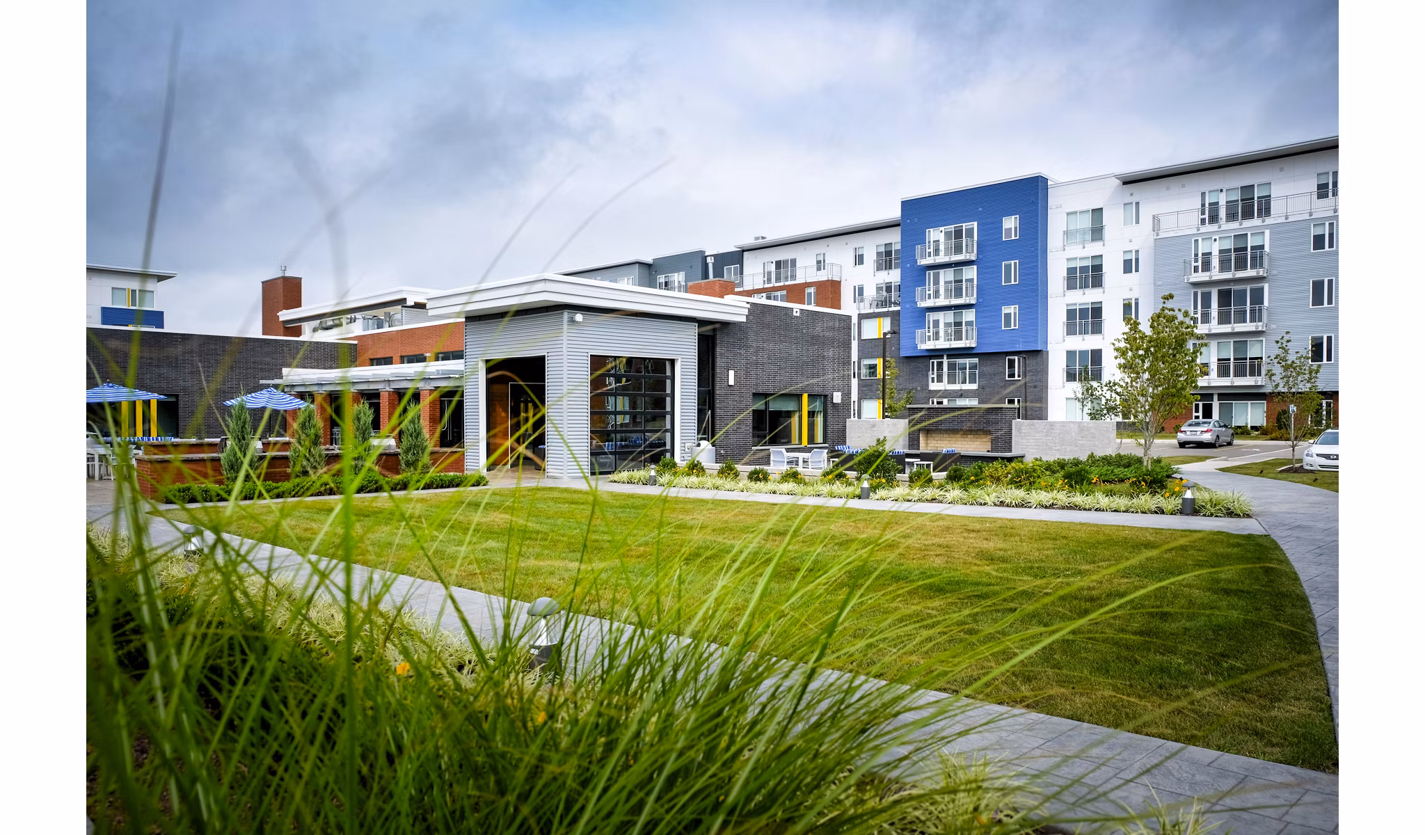 Modern clubhouse with cozy seating and entertainment area at Ridge at Robinson Apartments