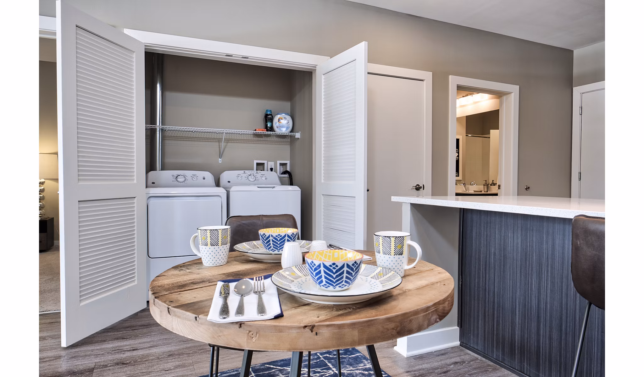 Modern laundry room with energy-efficient appliances at Ridge at Robinson Apartments