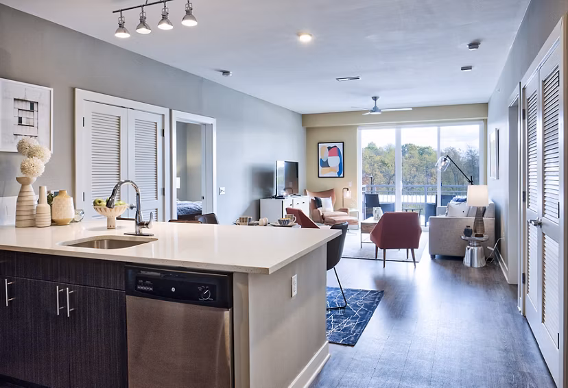 Modern kitchen with stainless steel appliances at Ridge at Robinson Apartments