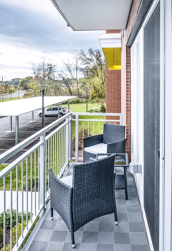Private patio with scenic views at Ridge at Robinson Apartments