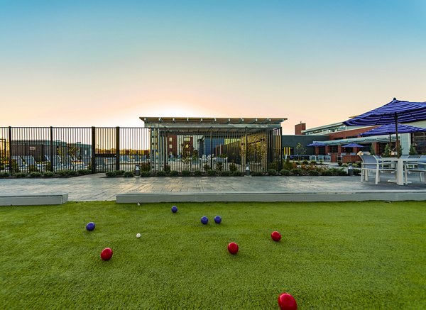 Outdoor sport court at Ridge at Robinson Apartments offering basketball and tennis facilities