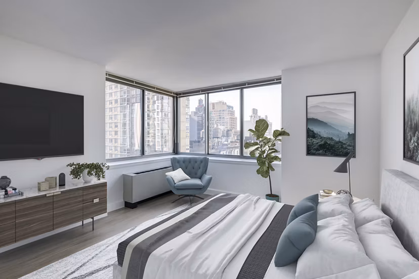 Bedroom featuring modern decor and natural light at 800 Sixth Apartments, luxury living in a Greystar-managed property