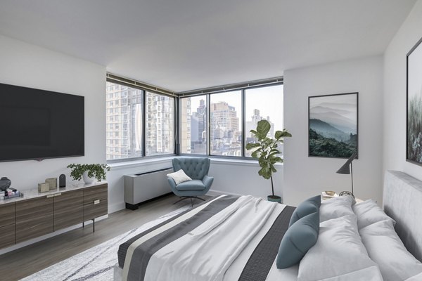 Bedroom featuring modern decor and natural light at 800 Sixth Apartments, luxury living in a Greystar-managed property