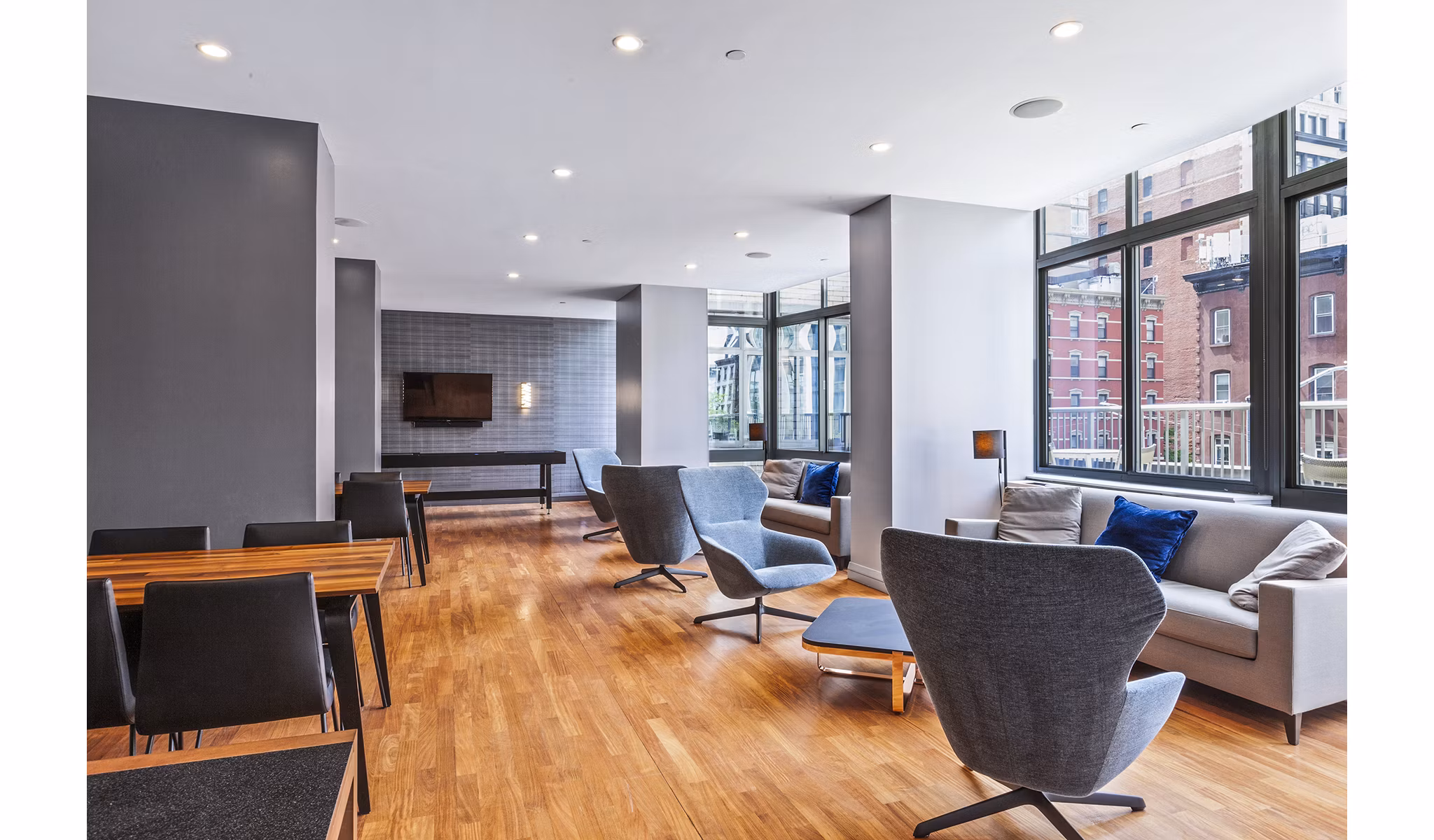 Modern meeting facility at 800 Sixth Apartments featuring sleek design and advanced audio-visual equipment