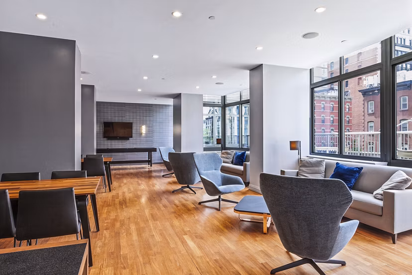 Modern meeting facility at 800 Sixth Apartments featuring sleek design and advanced audio-visual equipment