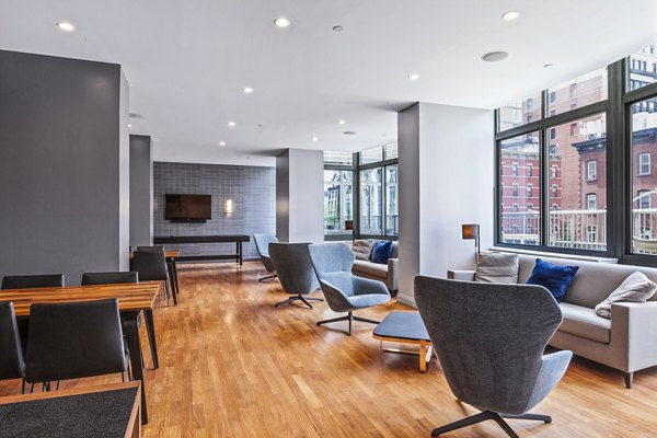 Modern meeting facility at 800 Sixth Apartments featuring sleek design and advanced audio-visual equipment