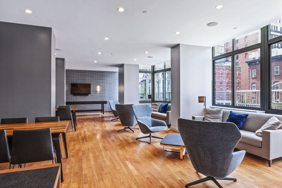Modern meeting facility at 800 Sixth Apartments featuring sleek design and advanced audio-visual equipment