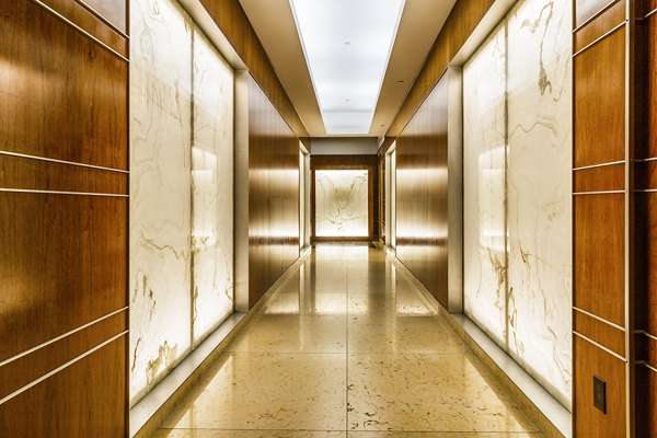 Hallway featuring contemporary lighting and elegant design at 800 Sixth Apartments, Greystar luxury apartments in downtown Seattle