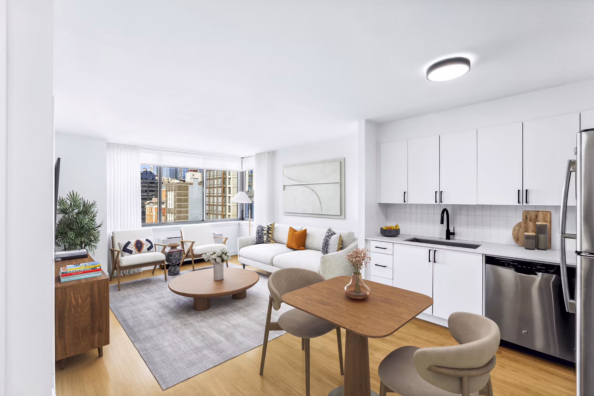 Dining room with modern decor and large windows at 800 Sixth Apartments, offering luxury living in an urban setting