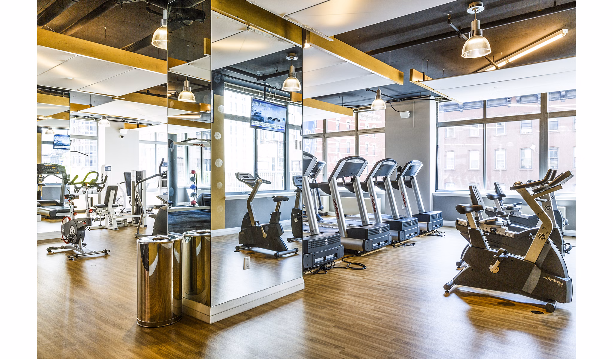 State-of-the-art fitness center with modern equipment at 800 Sixth Apartments