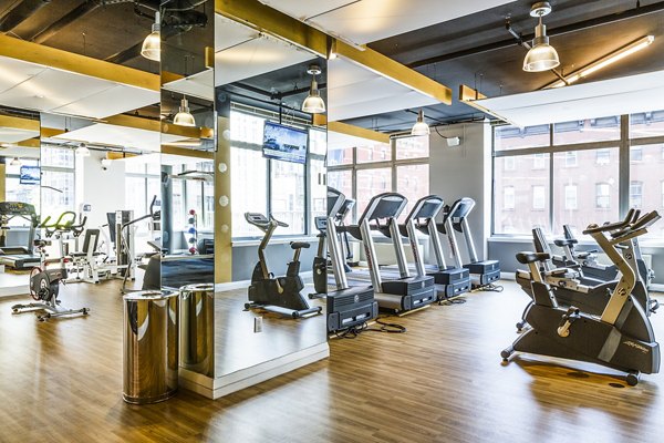 State-of-the-art fitness center with modern equipment at 800 Sixth Apartments