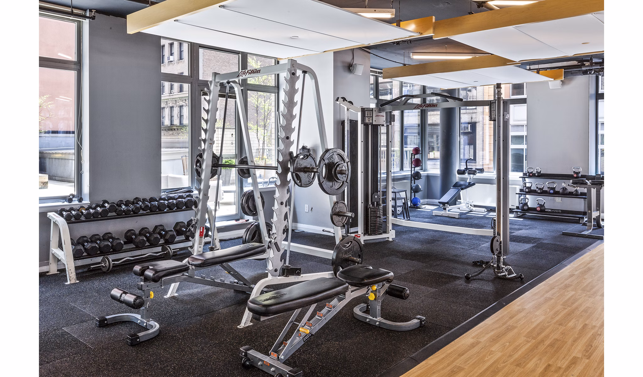 Modern fitness center with state-of-the-art equipment at 800 Sixth Apartments, ideal for enhancing your fitness routine